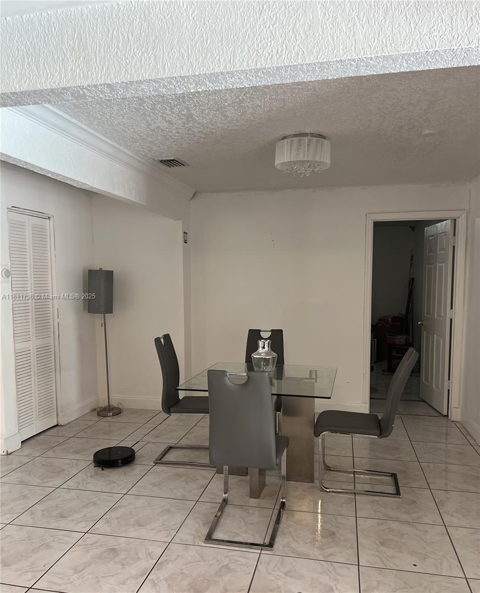 13360 Southwest 43rd Street Miami, FL 33175 - Photo 3 of 12 a view of a room with lounge chair