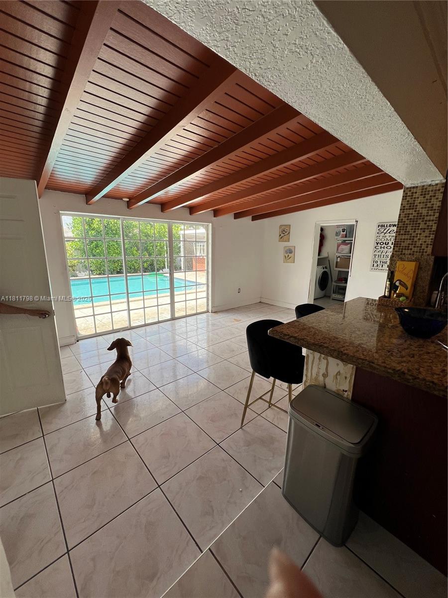 13360 Southwest 43rd Street Miami, FL 33175 - Photo 4 of 12 a room with furniture and a window