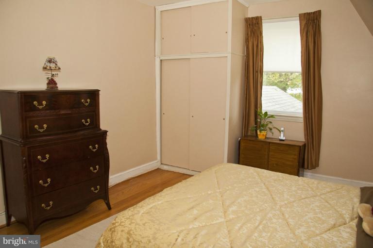 3601 Clifmar Road Windsor Mill, MD 21244 - Photo 22 of 30 a bedroom with a bed and a window