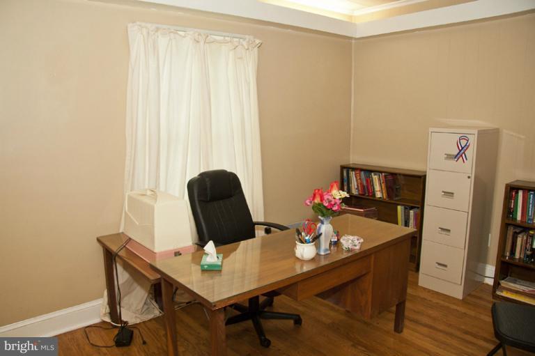 3601 Clifmar Road Windsor Mill, MD 21244 - Photo 29 of 30 a view of a workspace with furniture and a window