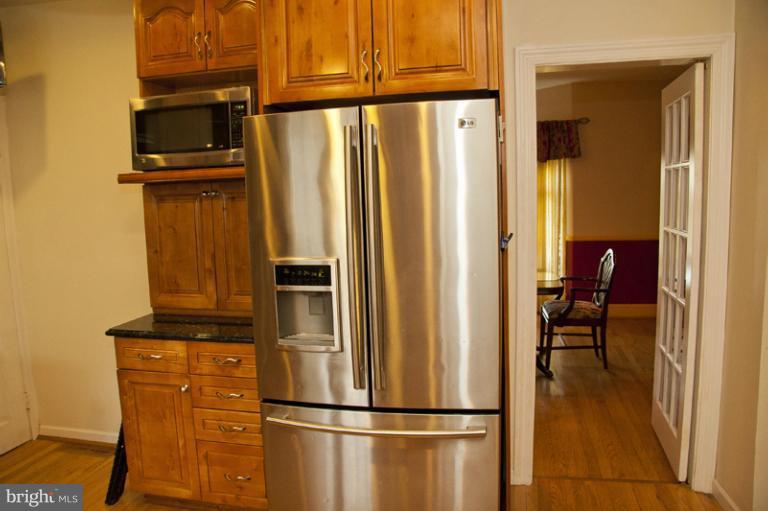 3601 Clifmar Road Windsor Mill, MD 21244 - Photo 9 of 30 a view of kitchen with furniture and refrigerator