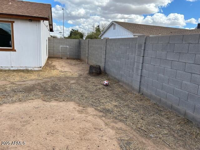 3056 North 68th Lane Phoenix, AZ 85033 - Photo 5 of 6 BACKYARD 1
