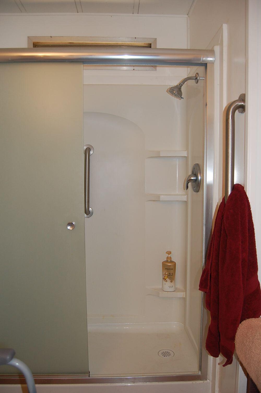 350 Hamilton Avenue Cave Junction, OR 97523 - Photo 13 of 23 a bathroom with a shower
