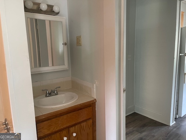 601 Nottingham Street Thomaston, GA 30286 - Photo 11 of 15 a bathroom with a sink and a mirror
