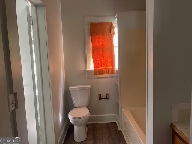 601 Nottingham Street Thomaston, GA 30286 - Photo 12 of 15 a bathroom with a toilet and a sink
