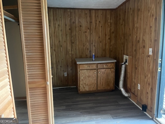 601 Nottingham Street Thomaston, GA 30286 - Photo 13 of 15 a room with a stove and a wooden door