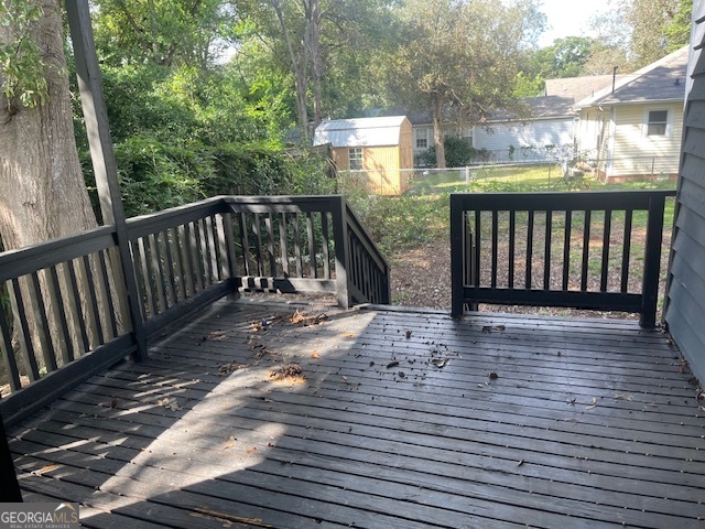 601 Nottingham Street Thomaston, GA 30286 - Photo 15 of 15 a view of a street with wooden fence