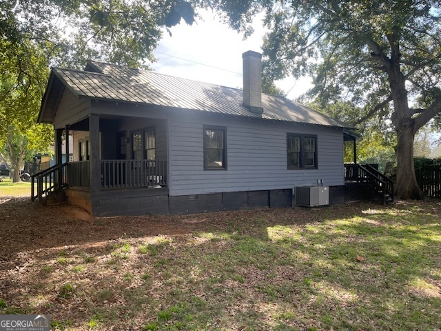 601 Nottingham Street Thomaston, GA 30286 - Photo 3 of 15 a view of a house with a yard