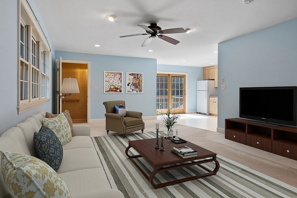 10 Ann Lees Road Harvard, MA 01451 - Photo 29 of 41 a living room with furniture and a flat screen tv