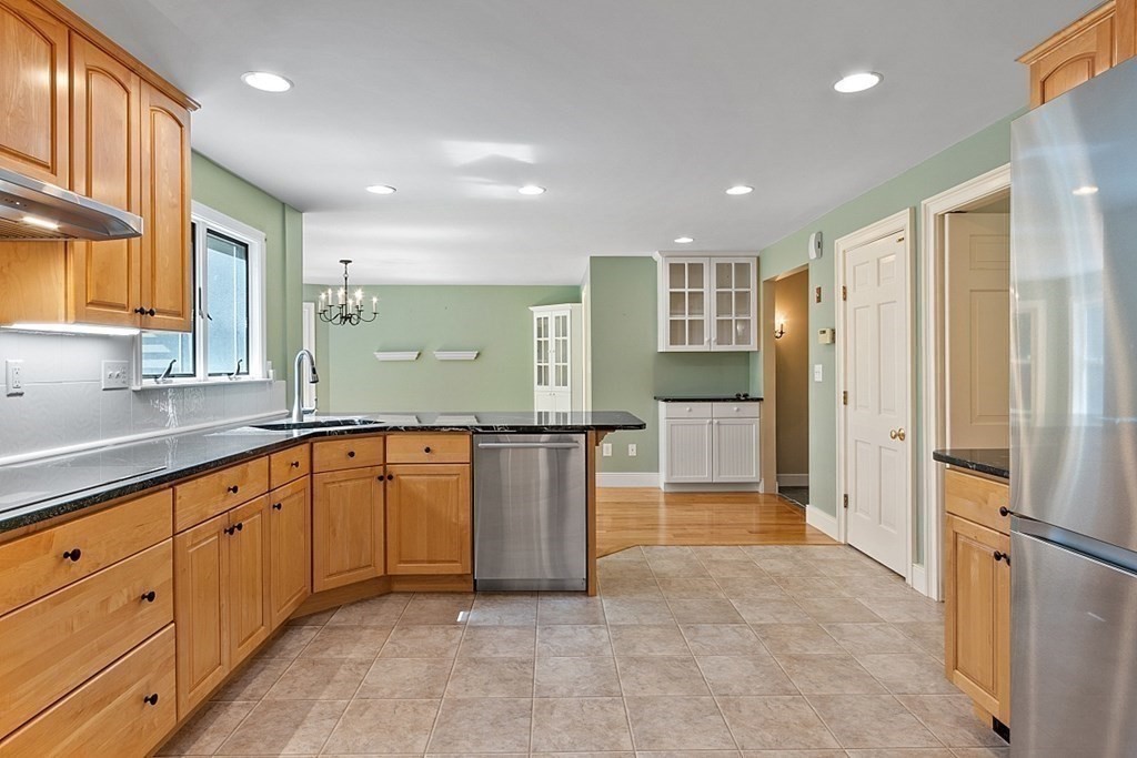 10 Ann Lees Road Harvard, MA 01451 - Photo 5 of 41 a large kitchen with stainless steel appliances granite countertop a refrigerator and a sink