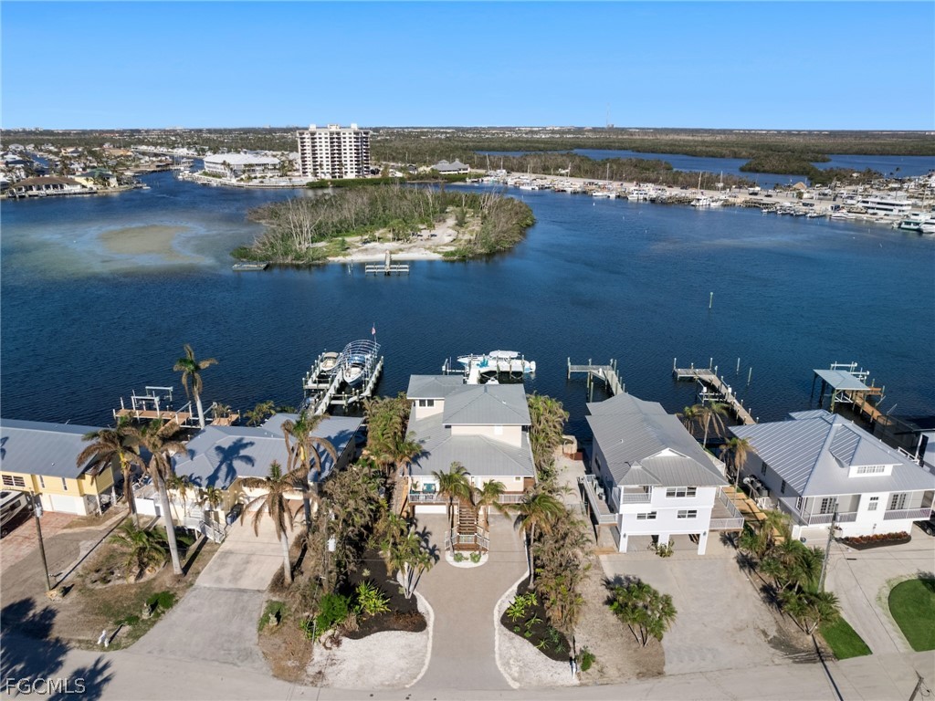921 Prescott Street Fort Myers Beach, FL 33931 - Photo 47 of 50 an aerial view of residential houses with outdoor space