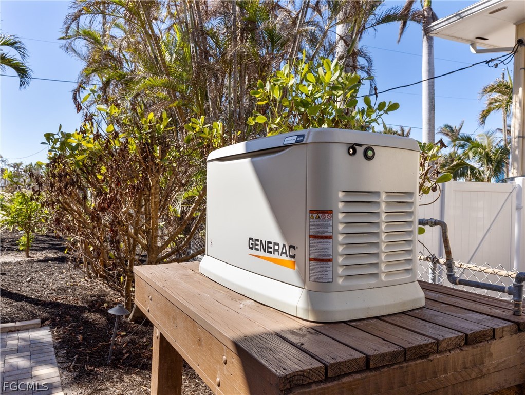 921 Prescott Street Fort Myers Beach, FL 33931 - Photo 48 of 50 a view of a yard with a sink and a potted plant