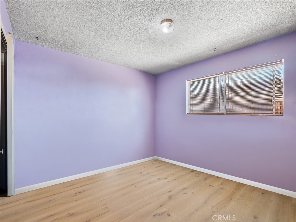 16003 Chestnut Street Hesperia, CA 92345 - Photo 15 of 28 an empty room with a workbench
