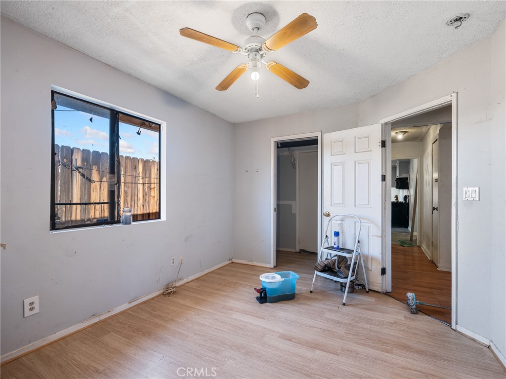 16003 Chestnut Street Hesperia, CA 92345 - Photo 17 of 28 wooden floor and windows in a room
