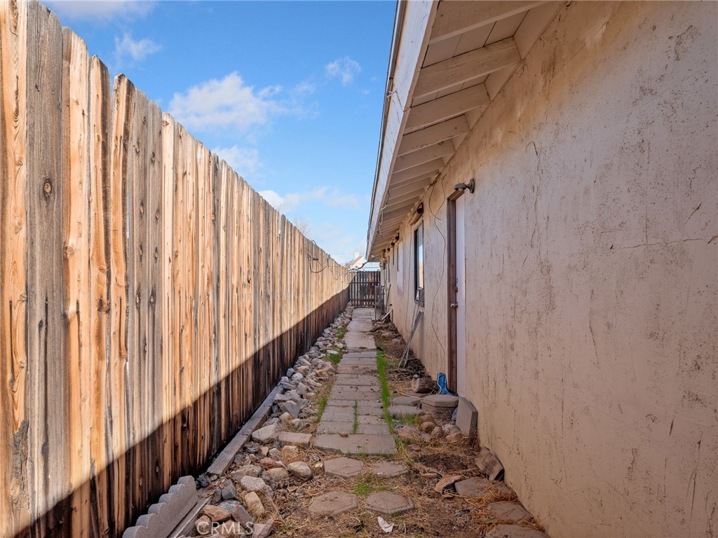 16003 Chestnut Street Hesperia, CA 92345 - Photo 22 of 28 a view of a stairs and an entrance