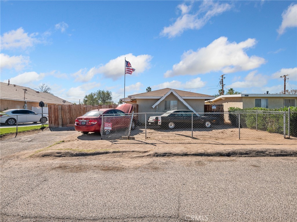 16003 Chestnut Street Hesperia, CA 92345 - Photo 25 of 28 a car parked on the side of the road