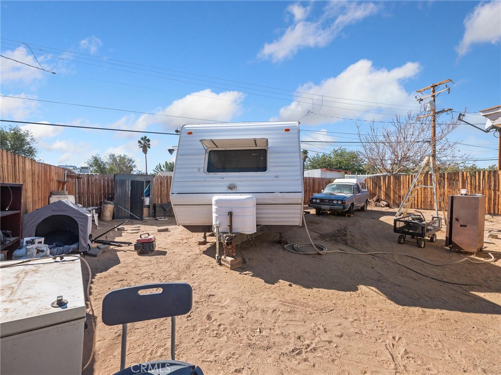 16003 Chestnut Street Hesperia, CA 92345 - Photo 28 of 28 a building outdoor space with patio furniture