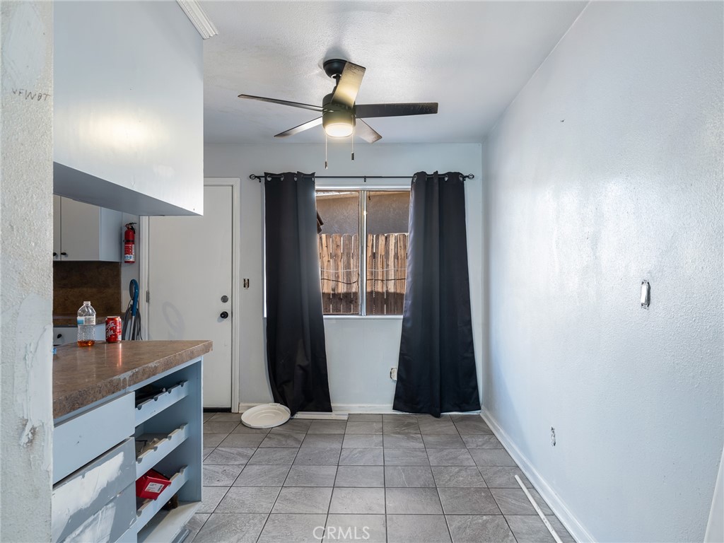 16003 Chestnut Street Hesperia, CA 92345 - Photo 8 of 28 wooden floor in an empty room