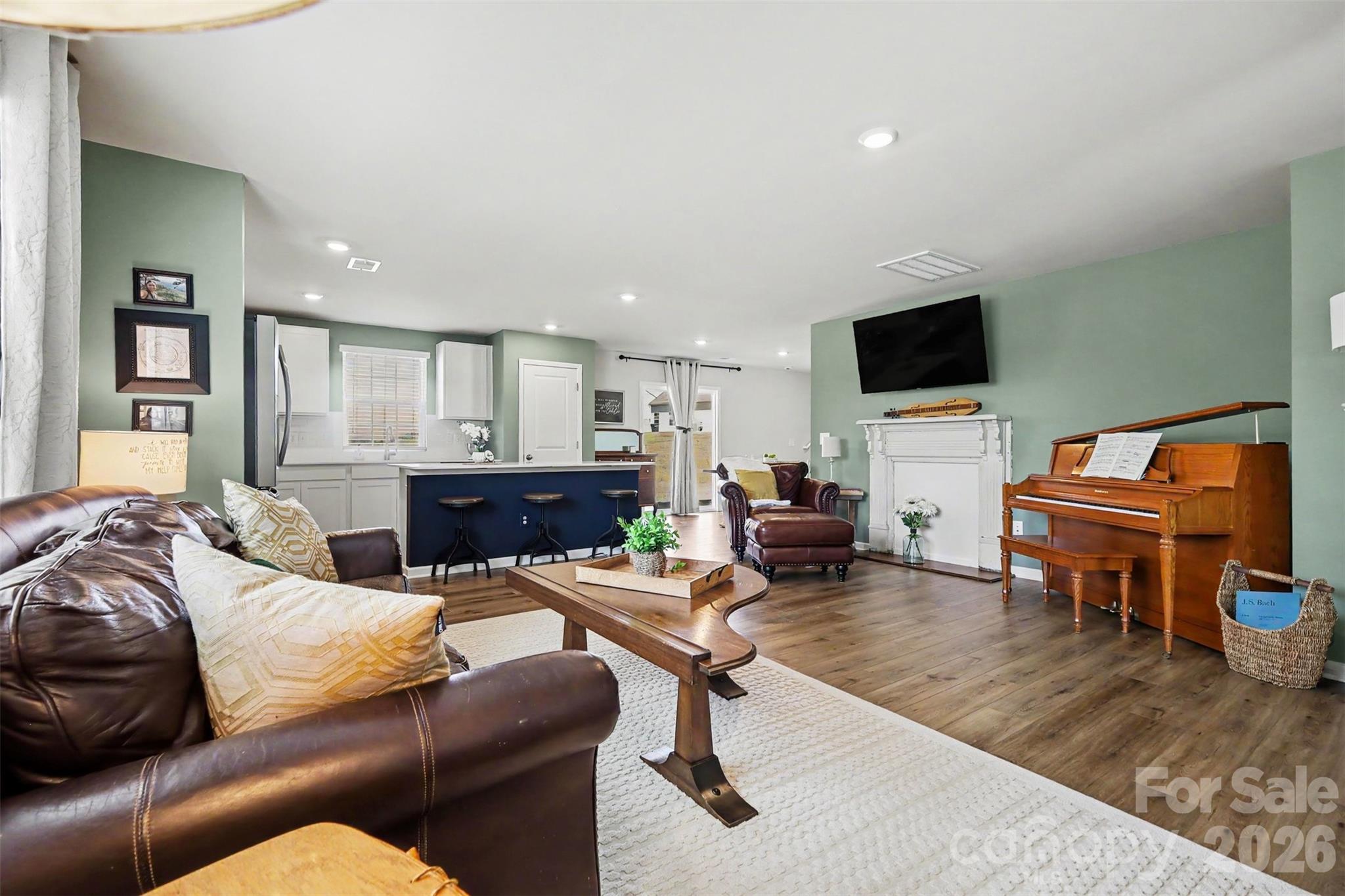 633 Mile Crk Road Edgemoor, SC 29712 - Photo 4 of 26 a living room with furniture and a flat screen tv