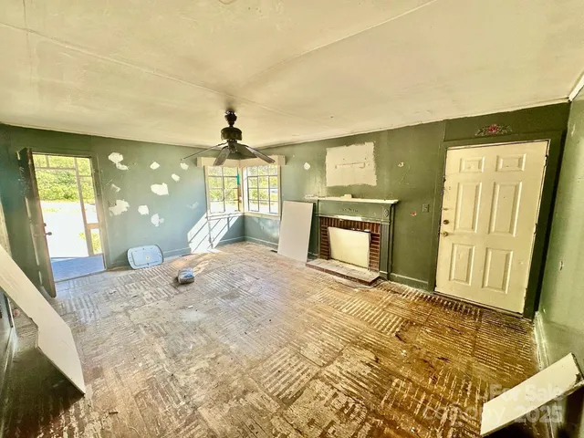 a view of a livingroom with a fireplace