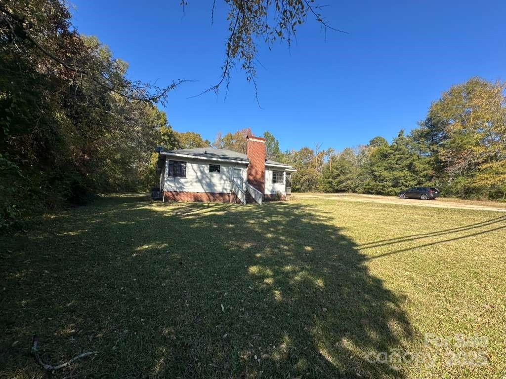 1016 East Arch Street Lancaster, SC 29720 - Photo 2 of 28 a view of a house with a big yard