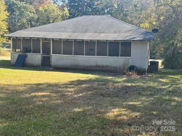 a view of a house with a swimming pool
