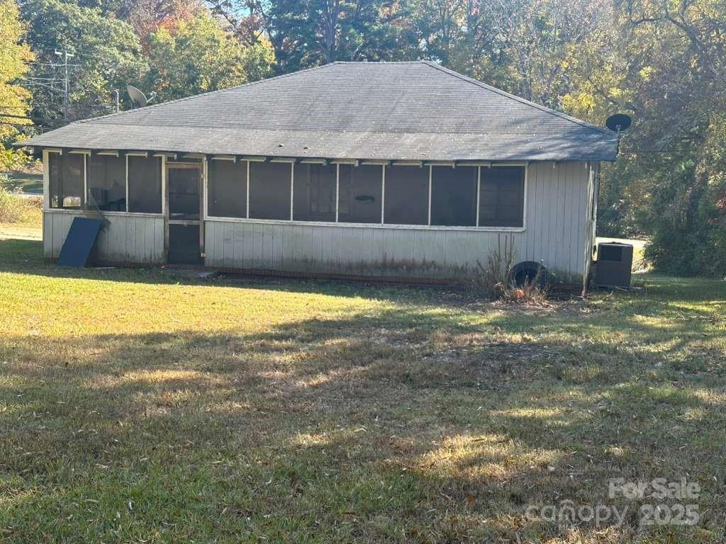 1016 East Arch Street Lancaster, SC 29720 - Photo 6 of 28 a view of a house with a swimming pool
