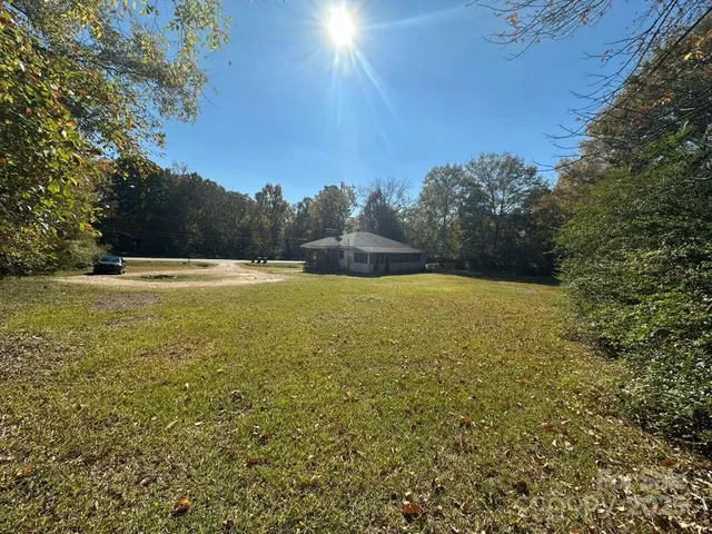 a view of an ocean and a yard