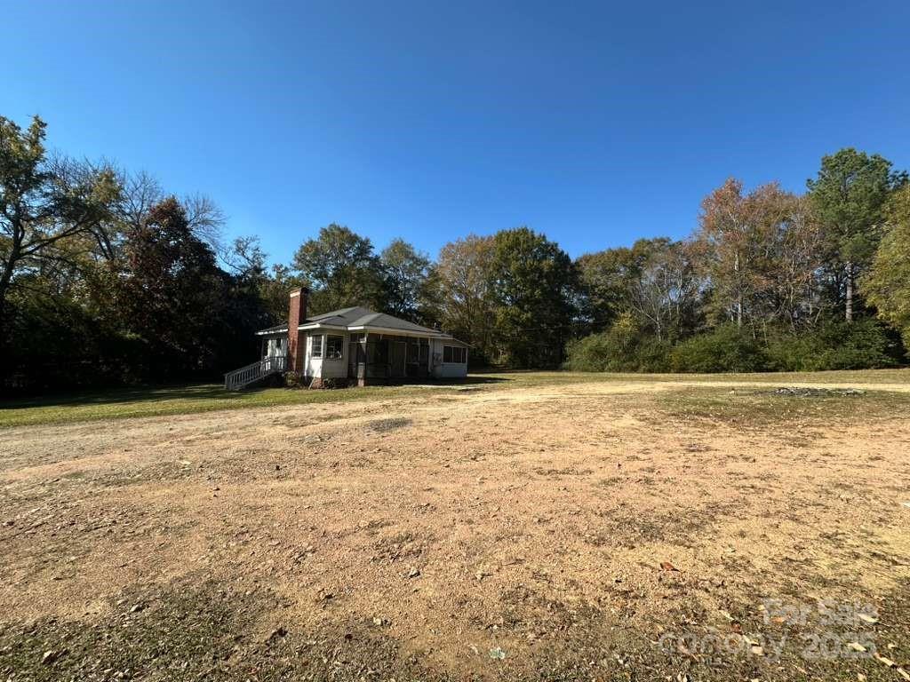 1016 East Arch Street Lancaster, SC 29720 - Photo 10 of 28 a view of a large yard with large trees