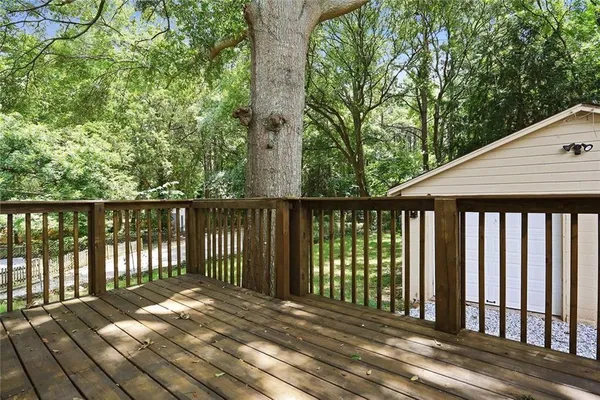 a view of a wooden roof deck