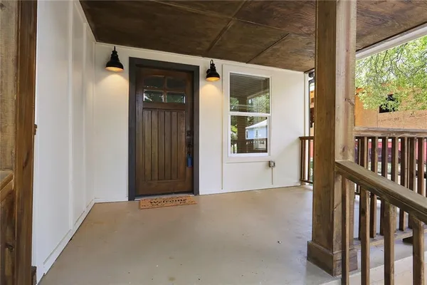 a view of a porch of a house