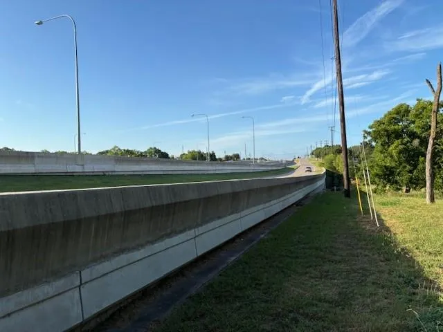 a view of a lake with a big yard