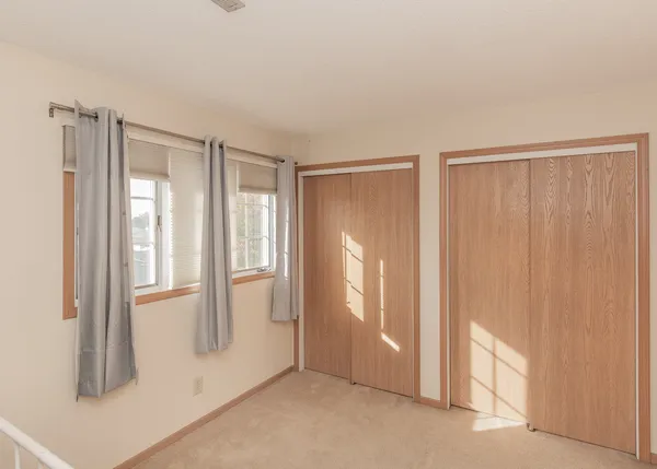 a view of an empty room and window