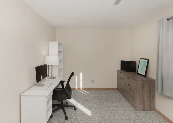 a view of workspace with lounge chair