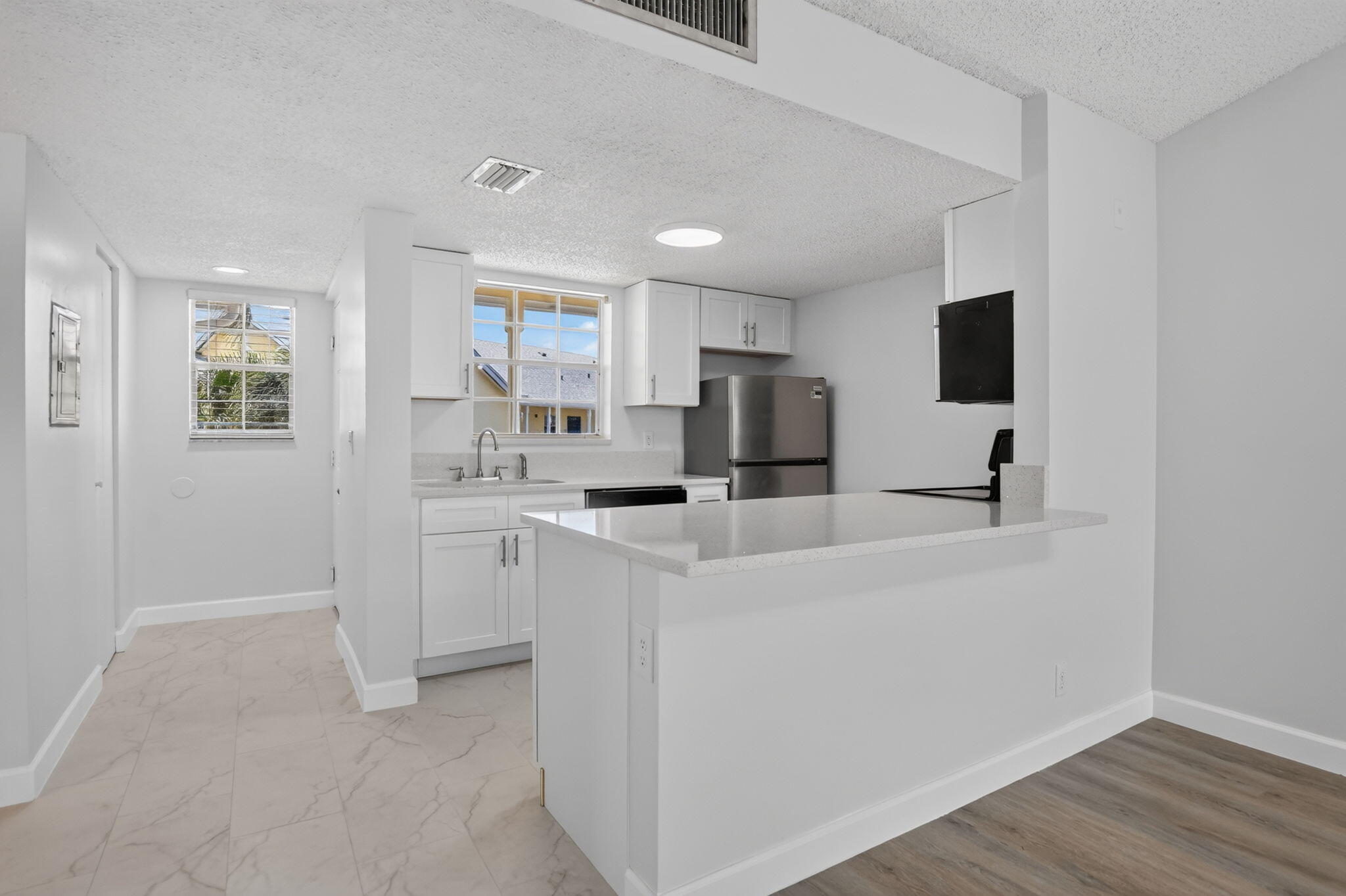 6323 La Costa Drive, Unit M Boca Raton, FL 33433 - Photo 3 of 33 kitchen