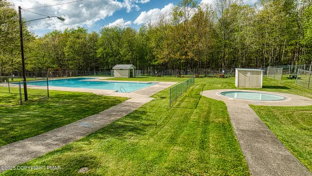 a view of a park with a slide