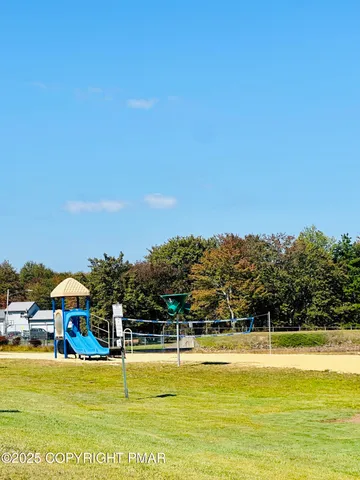 a view of swimming pool with an ocean view