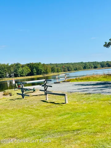a view of a swimming pool with an ocean view