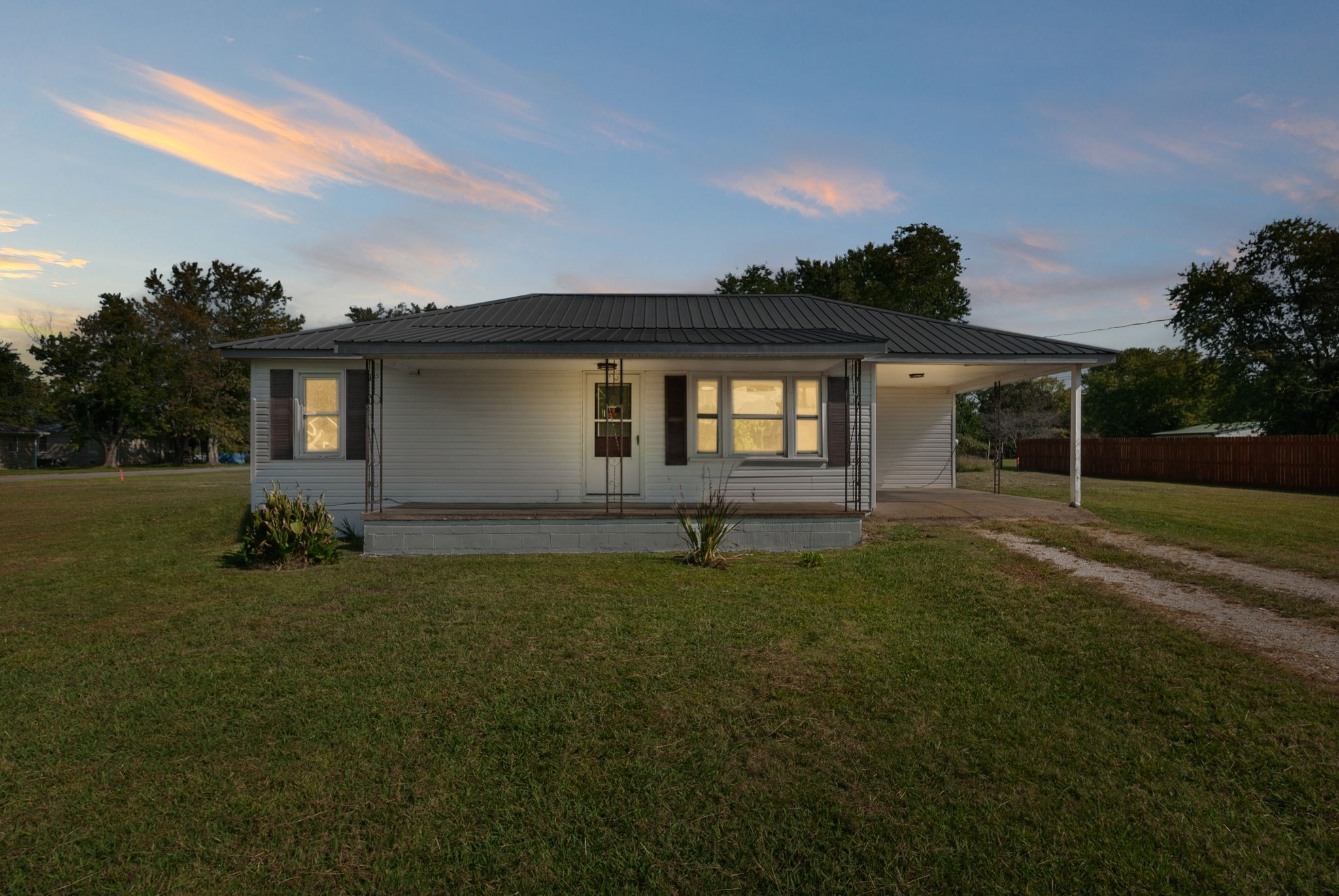 731 Smith Avenue Hohenwald, TN 38462 - Photo 2 of 28 a front view of house with yard