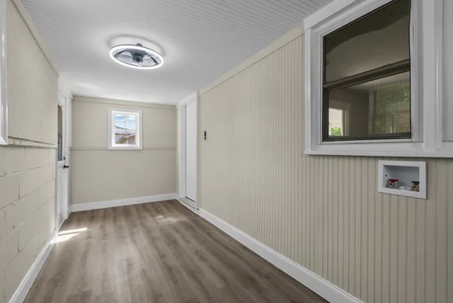 a view of a swimming pool with an outdoor seating and a yard