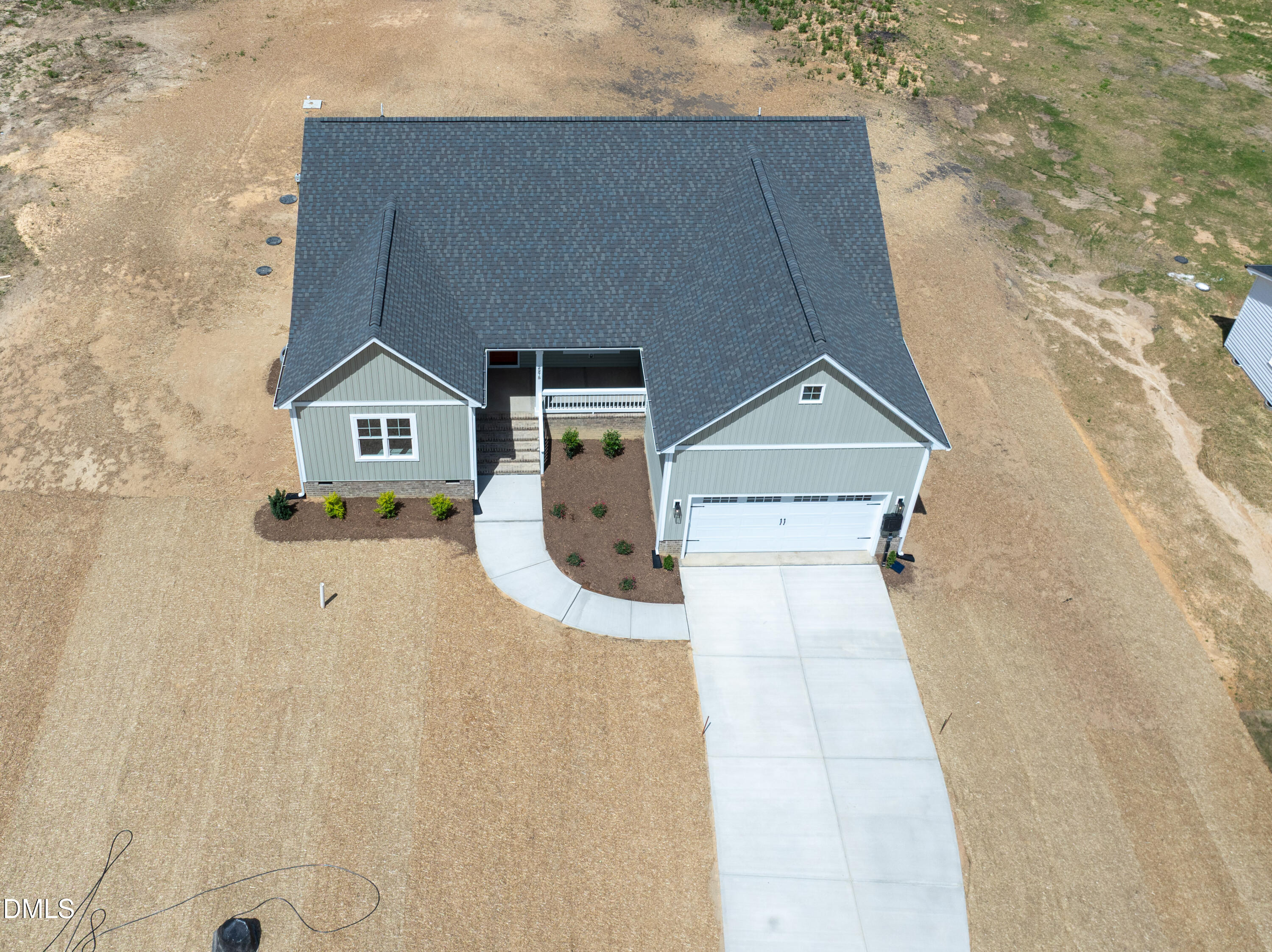2275 Peachtree Hills Road Spring Hope, NC 27882 - Photo 41 of 43 a house with trees in front of it