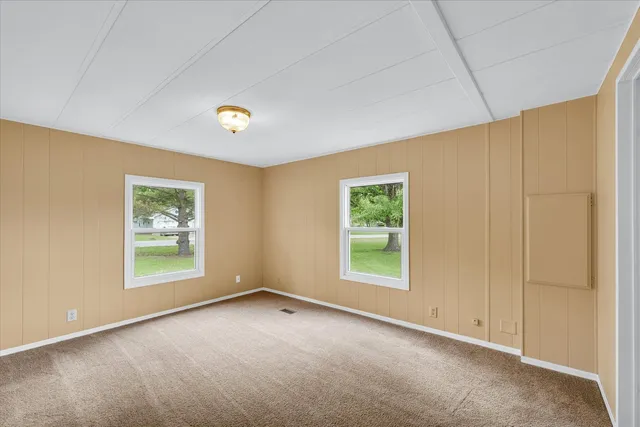 an empty room with windows