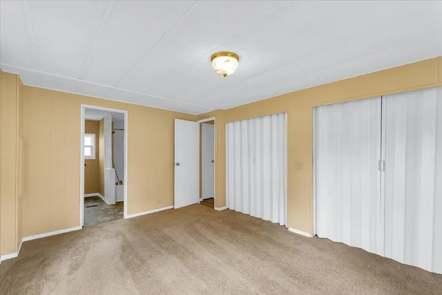 a bathroom with a tub and shower