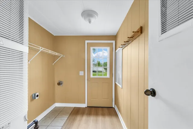 a backyard of a house with lots of green space