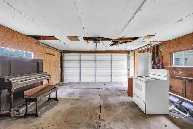 a picture of a wall with a white building