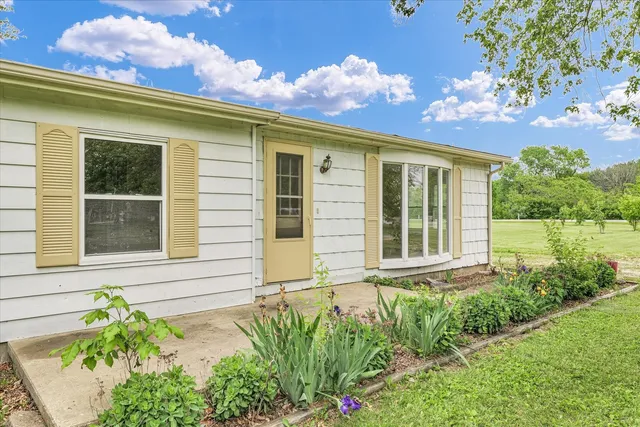 front view of house with a garden