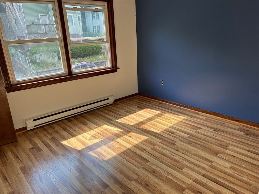 67 Everard Street Worcester, MA 01605 - Photo 9 of 13 a view of an empty room and window