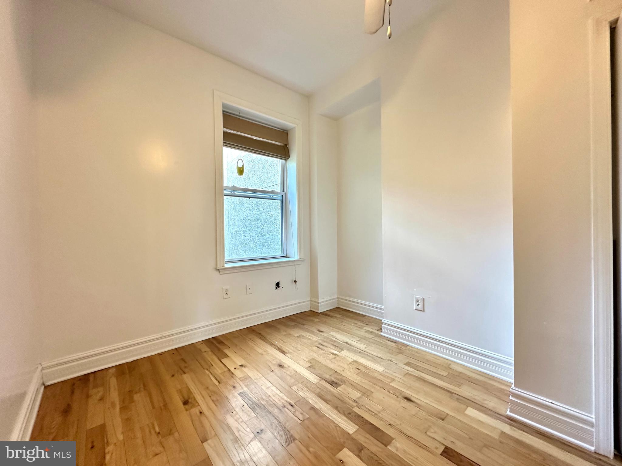 1214 North 5th Street, Unit 2 Philadelphia, PA 19122 - Photo 10 of 17 a view of an empty room and window