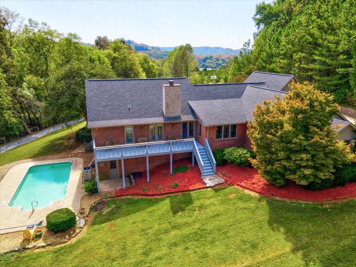 33466 Ardmore Ridge Road Ardmore, TN 38449 - Photo 54 of 62 a view of a house with a backyard