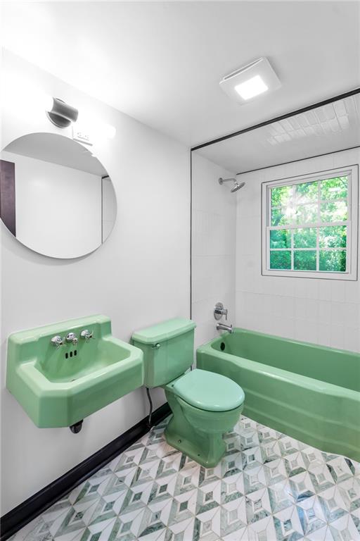 1981 North Decatur Road Atlanta, GA 30307 - Photo 15 of 20 a bathroom with a toilet sink and mirror